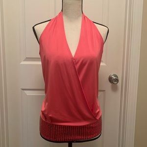 Pink sleeveless top with sequin banded hem